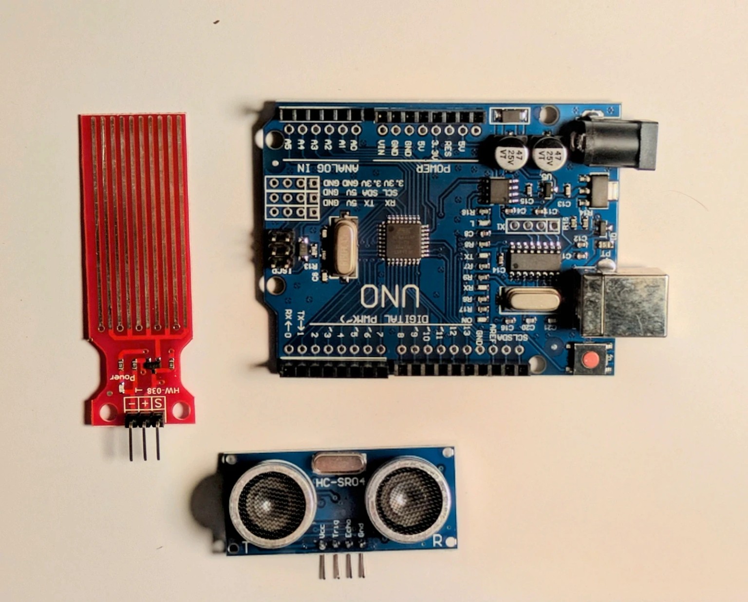 Arduino Uno, water sensor and ultrasonic sensor