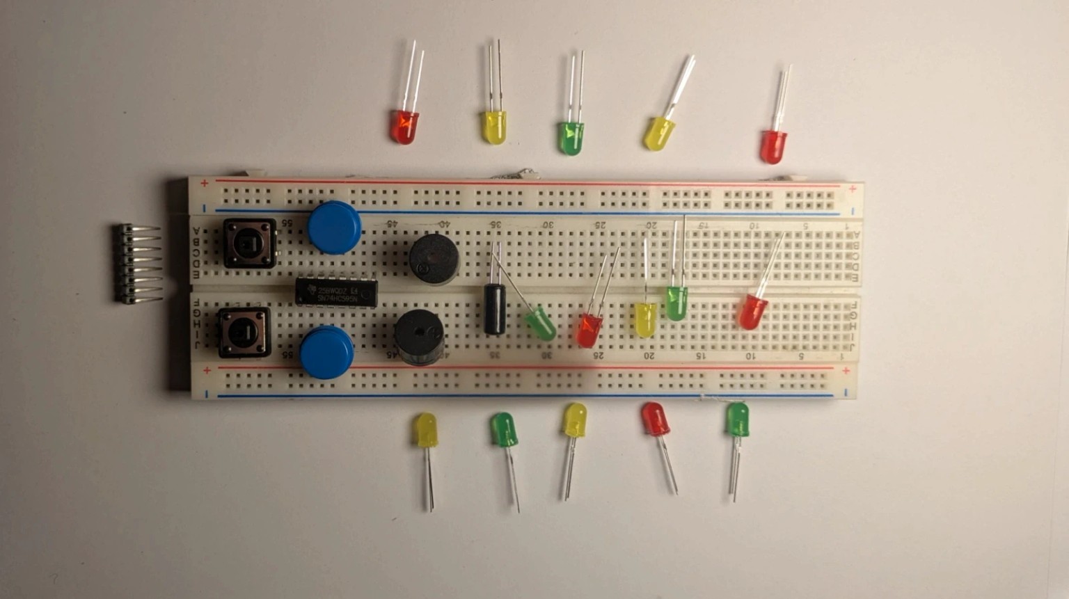 Breadboard with LEDs, buttons and buzzers